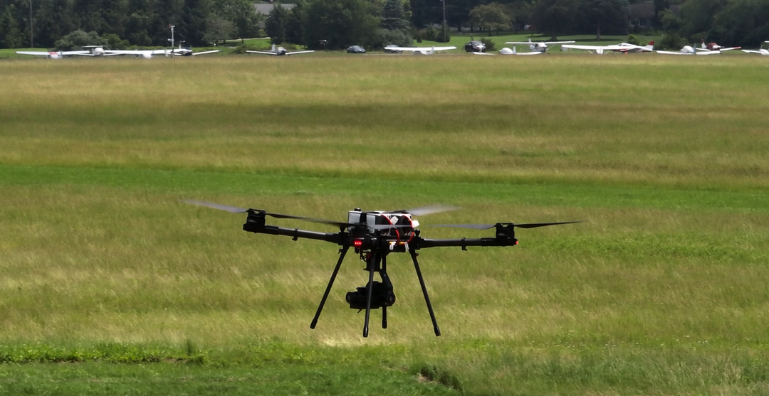 Drone Operation: Radio Communication for Nearby Aircraft